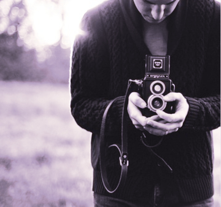 image of person holding camera